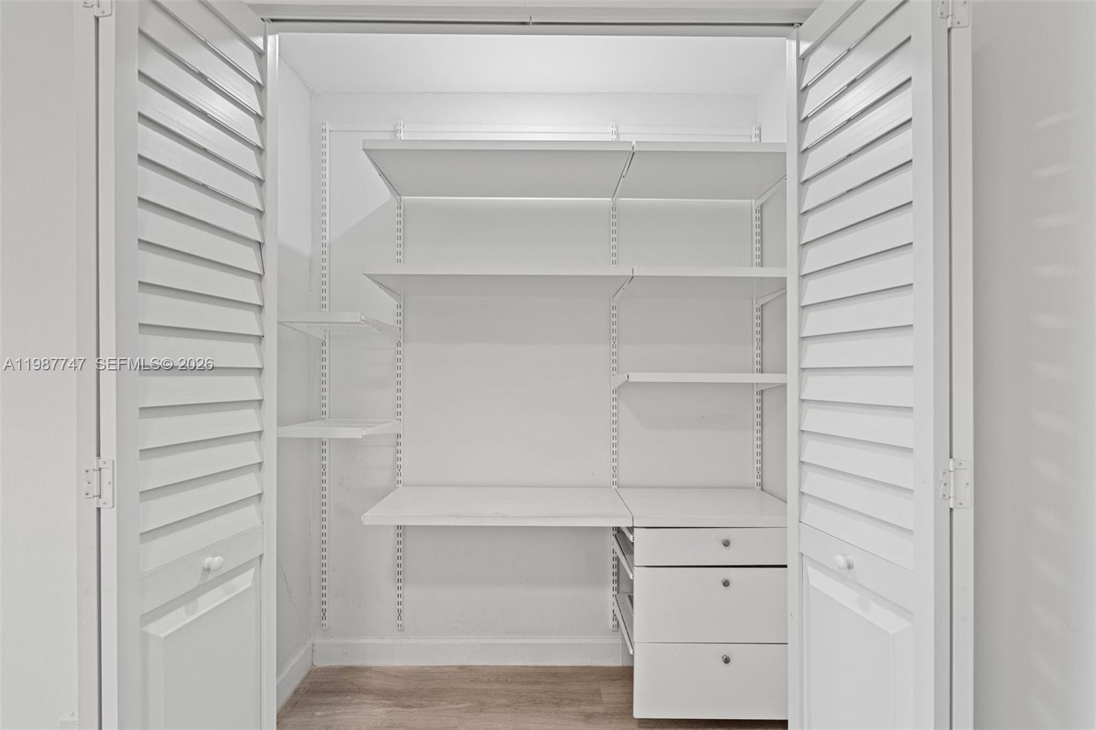 7765 Southwest 86th Street, Unit F2303 Miami, FL 33143 - Photo 8 of 50 a view of walk in closet