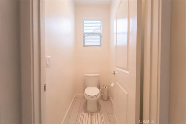 a bathroom with a toilet and a sink