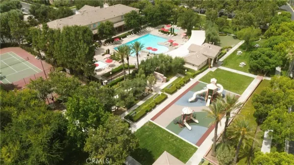 an aerial view of building and yard