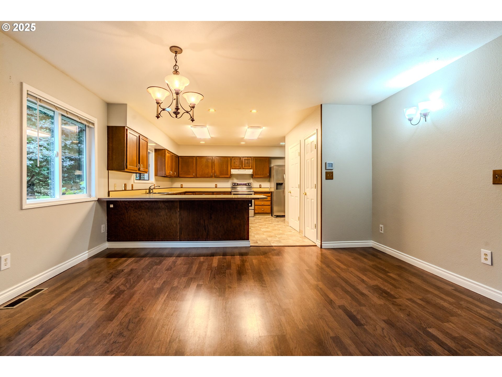35709 Southeast Lusted Road Boring, OR 97009 - Photo 11 of 48 a view of a kitchen with cabinets and wooden floor