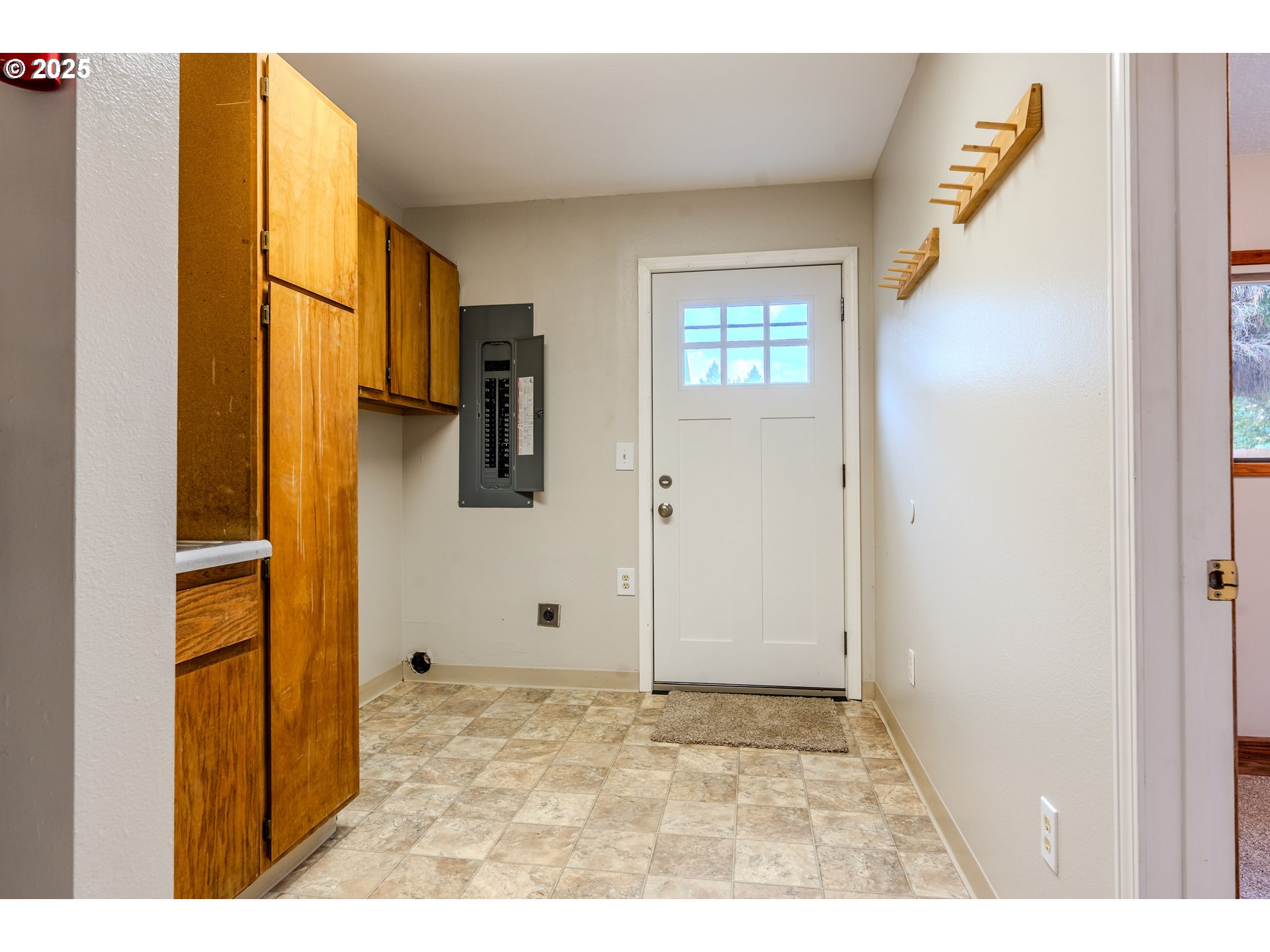 35709 Southeast Lusted Road Boring, OR 97009 - Photo 39 of 48 a view of a livingroom with wooden floor and entryway