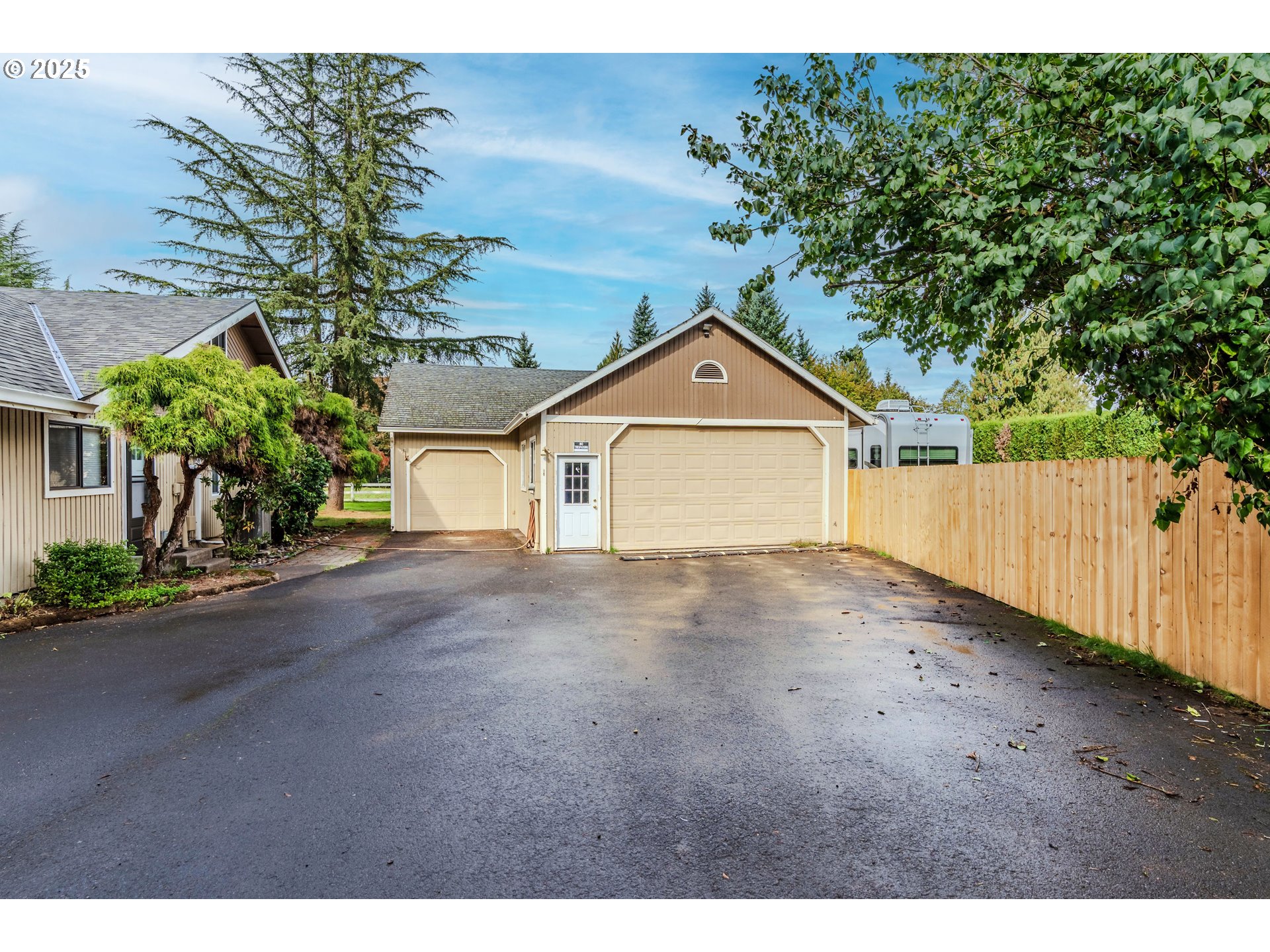 35709 Southeast Lusted Road Boring, OR 97009 - Photo 4 of 48 a front view of a house with a yard and garage