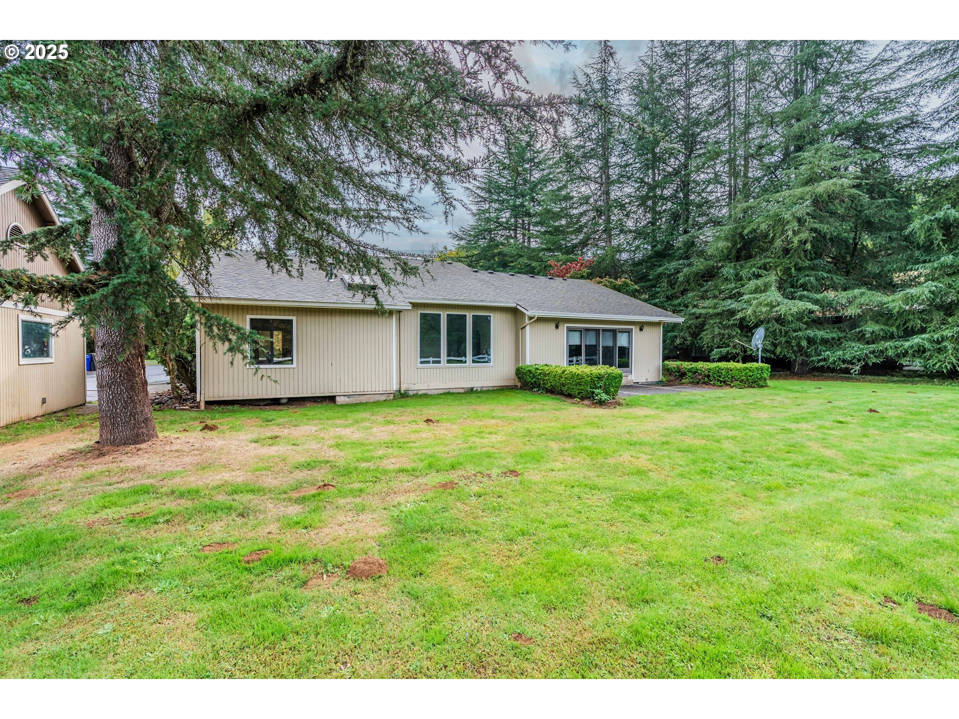 35709 Southeast Lusted Road Boring, OR 97009 - Photo 41 of 48 a house view with a garden space