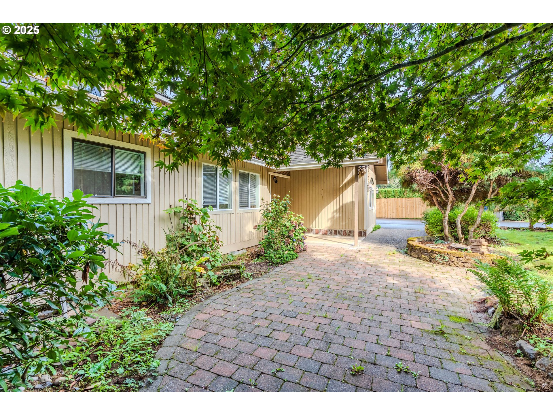 35709 Southeast Lusted Road Boring, OR 97009 - Photo 7 of 48 a backyard of a house with plants and trees