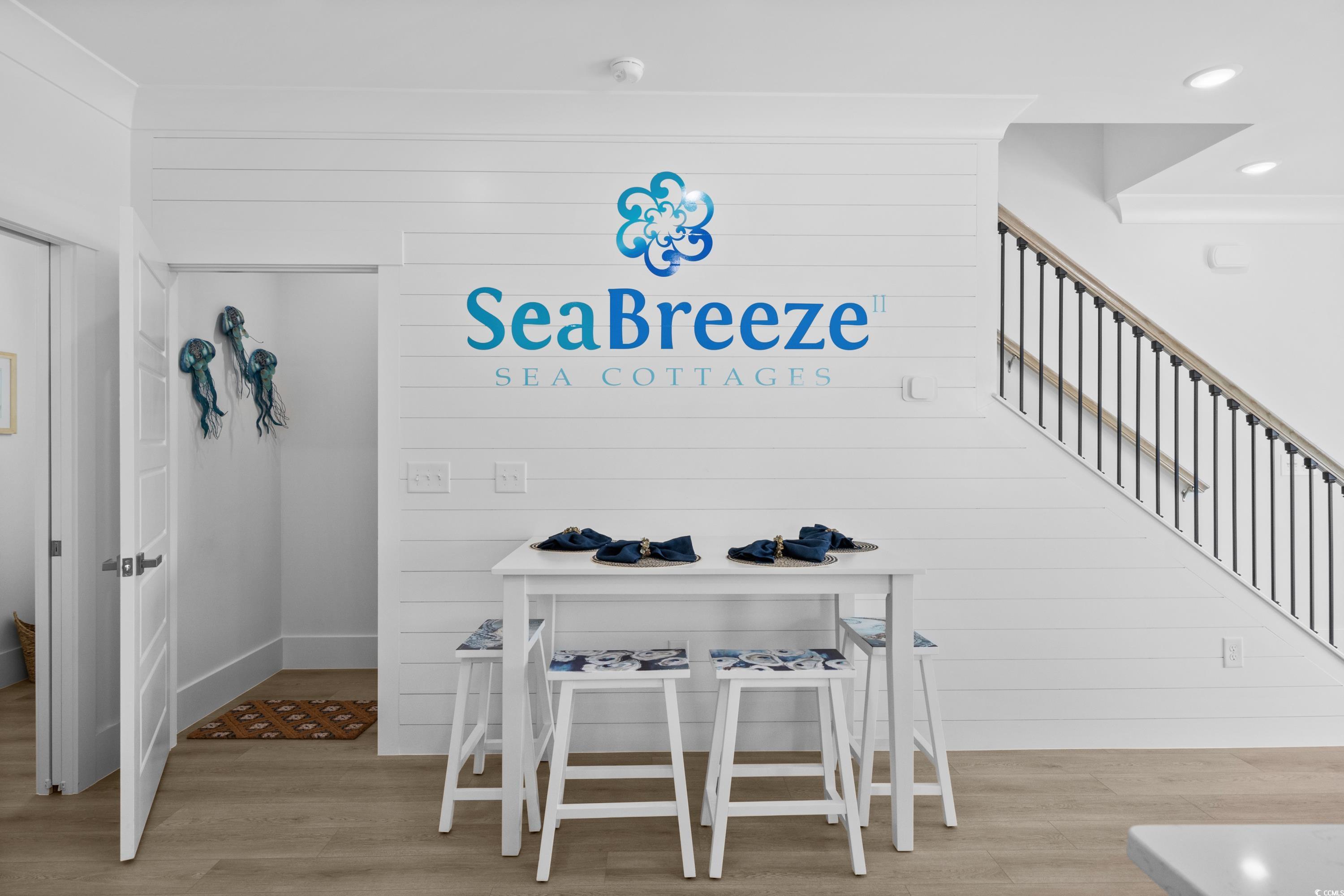 2303 Seaseeker Lane Myrtle Beach, SC 29577 - Photo 13 of 38 Living area featuring ornamental molding, ceiling fan, light wood-style flooring, recessed lighting, and baseboards