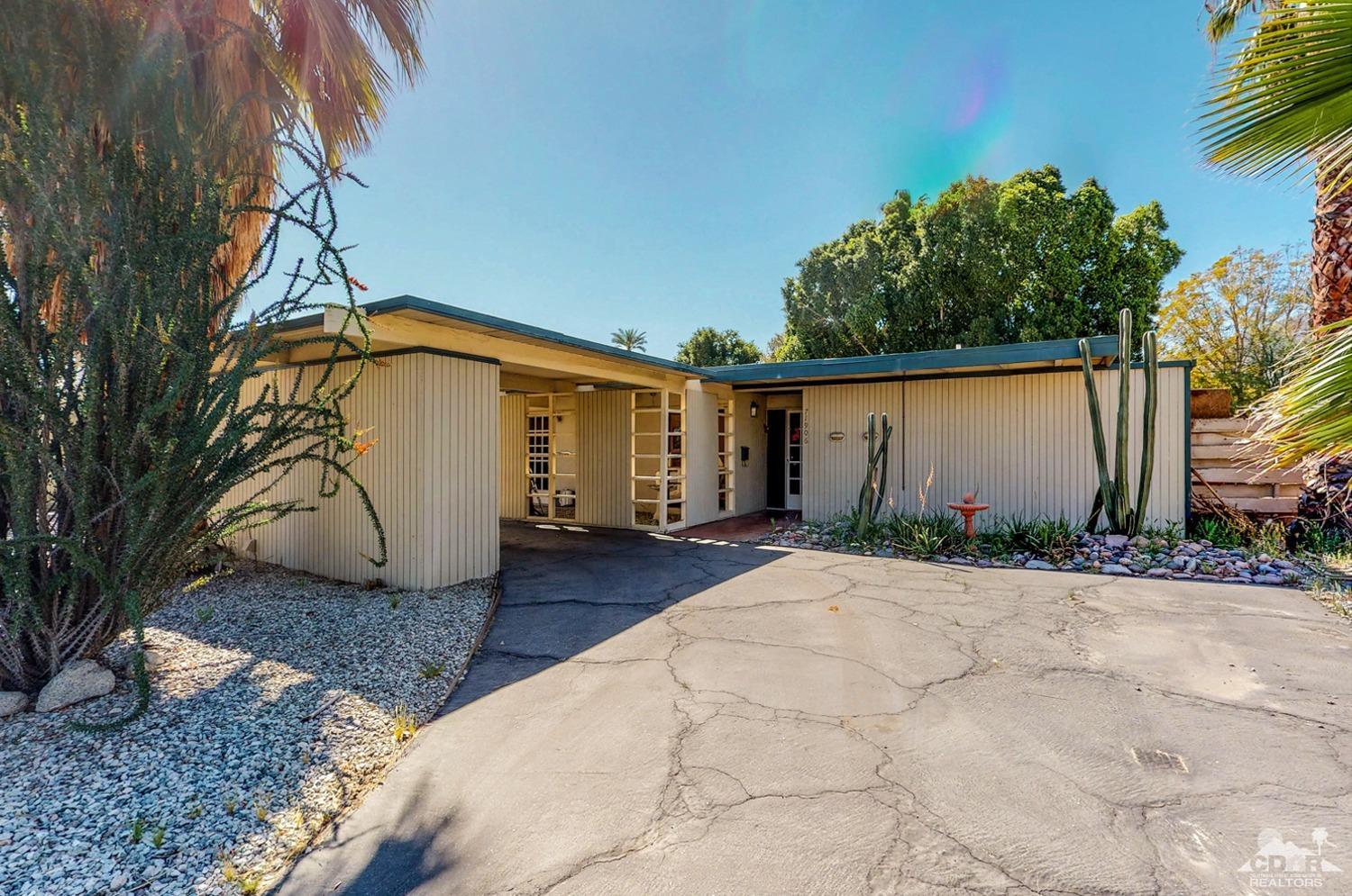 71906 Vista Del Rio Rancho Mirage, CA 92270 - Photo 1 of 27 a view of a house with a yard