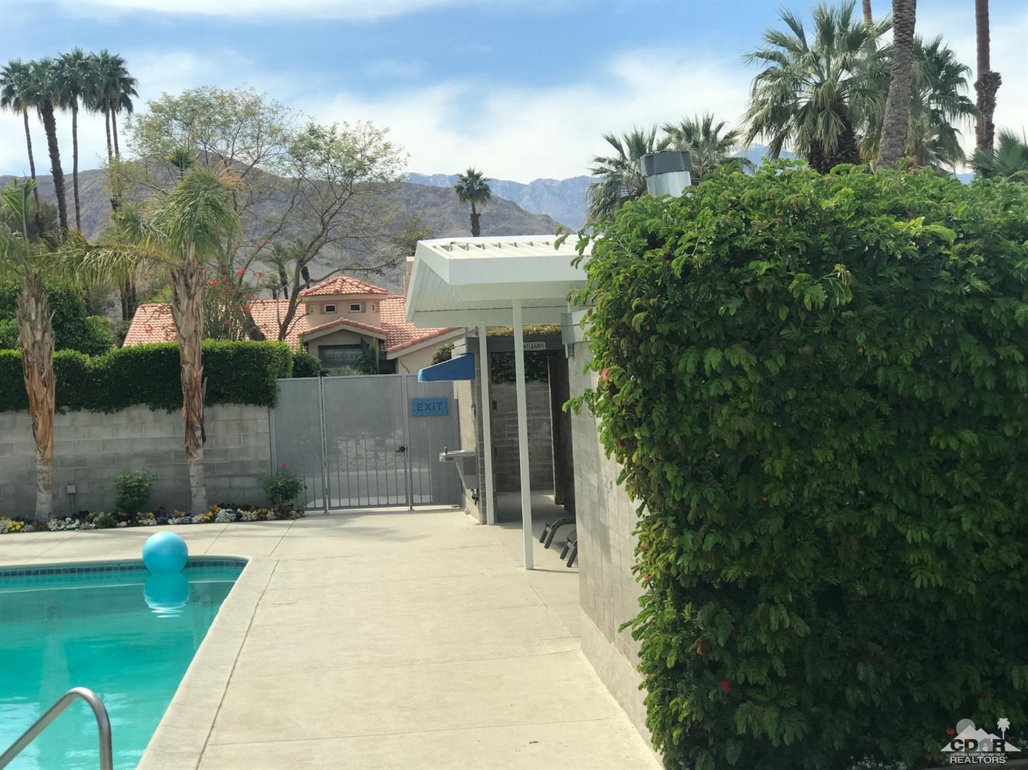 71906 Vista Del Rio Rancho Mirage, CA 92270 - Photo 26 of 27 a front view of a house with a garden