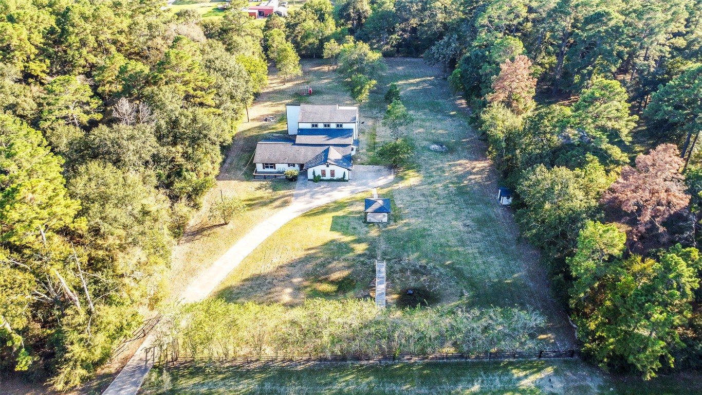 31423 Reids Prairie Road Waller, TX 77484 - Photo 2 of 49 a view of a yard with plants