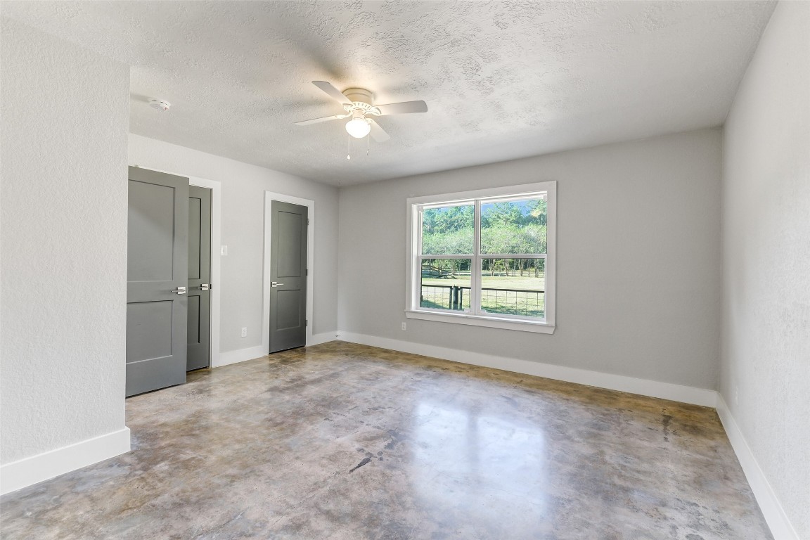 31423 Reids Prairie Road Waller, TX 77484 - Photo 27 of 49 a view of an empty room with a window