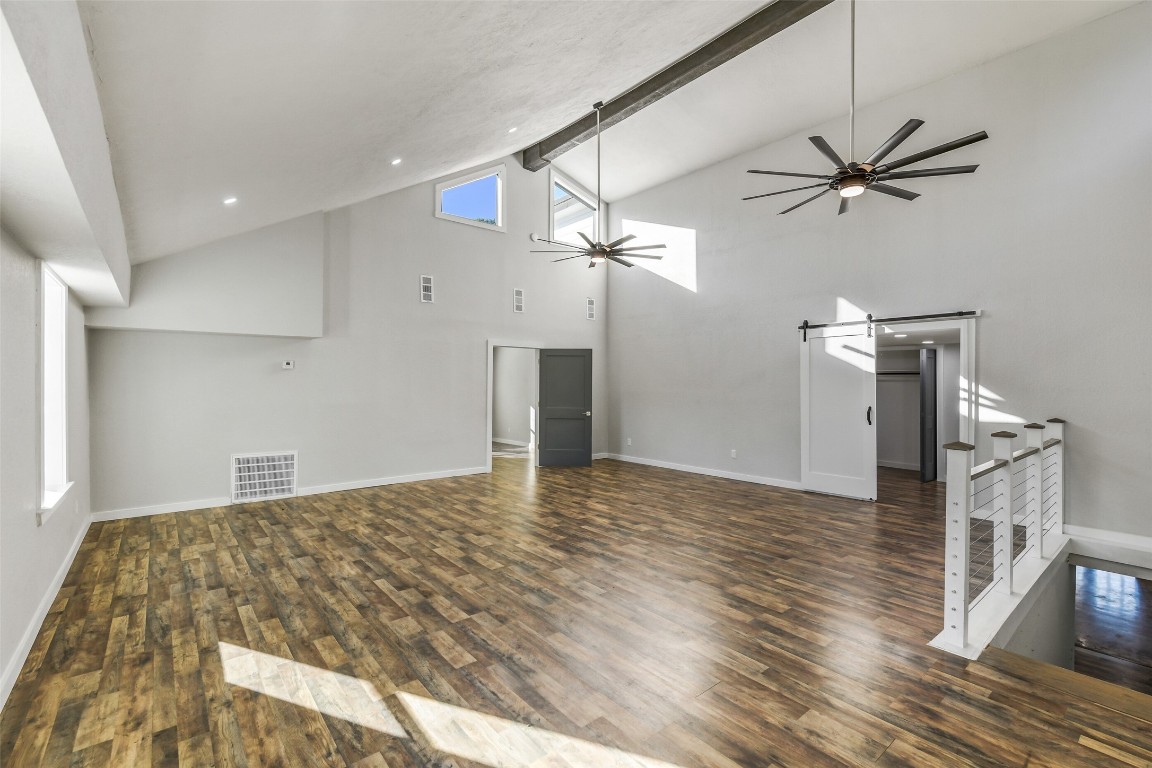 31423 Reids Prairie Road Waller, TX 77484 - Photo 30 of 49 a view of a livingroom with a ceiling fan and wooden floor