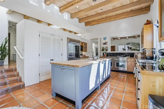 a large kitchen with a large window