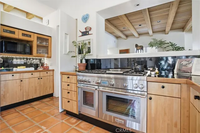 a bathroom with a sink a mirror and shower