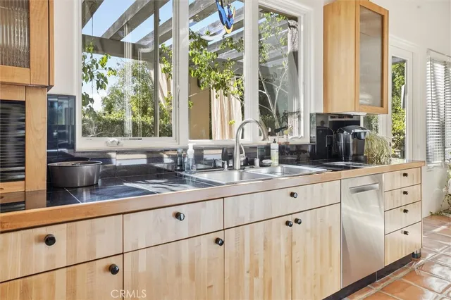 a view of a livingroom with furniture and a fireplace