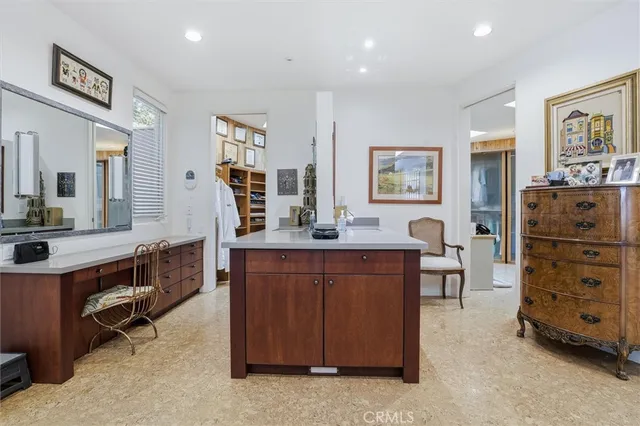 a living room with a couch and a fireplace