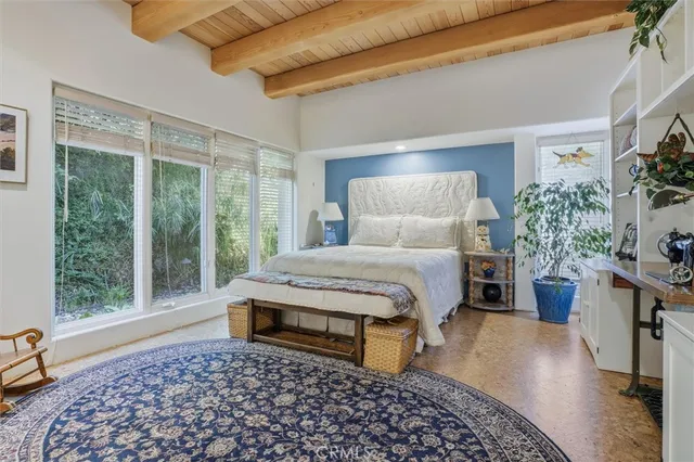 a bathroom with a shower sink and mirror