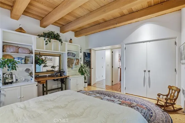 a view of a patio with table and chairs and potted plants