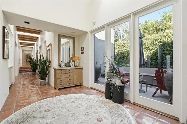 a view of a chairs and tables in the backyard