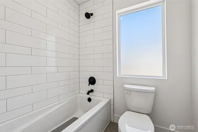 a workspace with furniture and a window