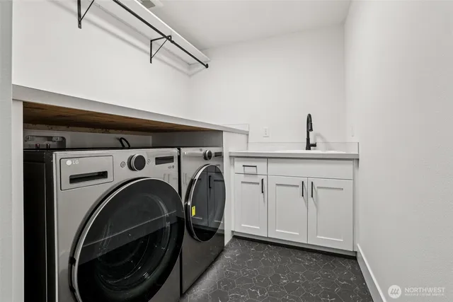 a work room with furniture and windows