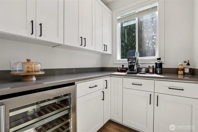 a view of a hallway with workspace