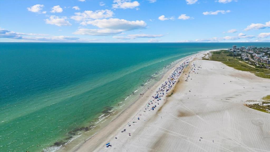 5830 Midnight Pass Road, Unit 63 Sarasota, FL 34242 - Photo 27 of 27 a view of a lake with a big yard