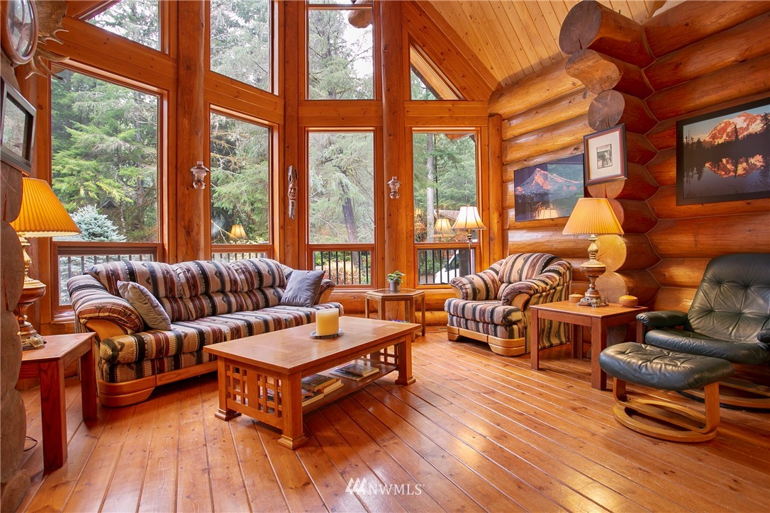 7097 Rainier Way Deming, WA 98244 - Photo 2 of 37 a living room with furniture and a large window
