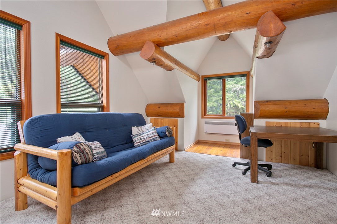 7097 Rainier Way Deming, WA 98244 - Photo 14 of 37 a bedroom with furniture and a window