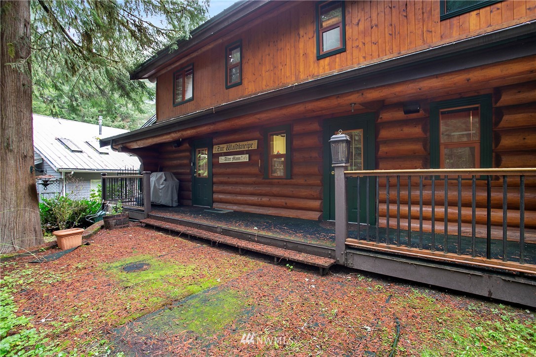 7097 Rainier Way Deming, WA 98244 - Photo 28 of 37 a view of a house with a wooden fence