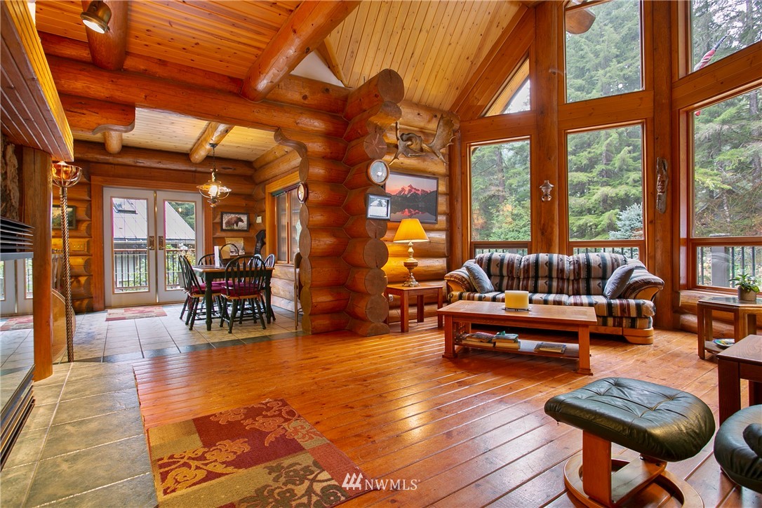 7097 Rainier Way Deming, WA 98244 - Photo 4 of 37 a living room with furniture and a wooden floor