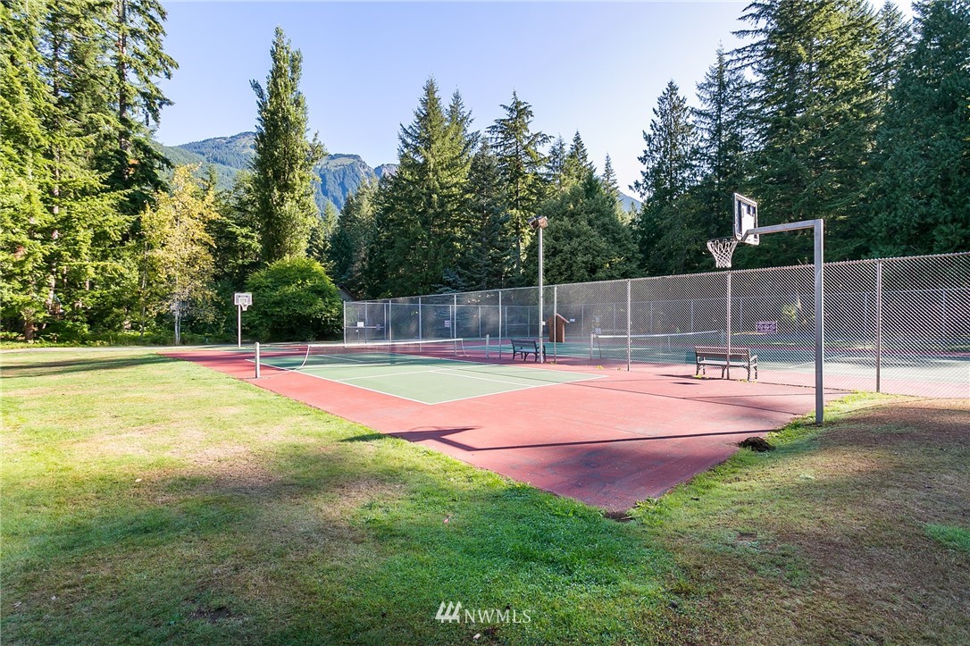 7097 Rainier Way Deming, WA 98244 - Photo 34 of 37 a view of a swimming pool with a yard