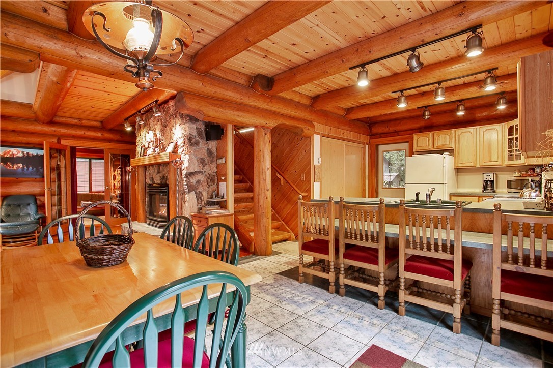 7097 Rainier Way Deming, WA 98244 - Photo 10 of 37 a view of a patio with a table and chairs
