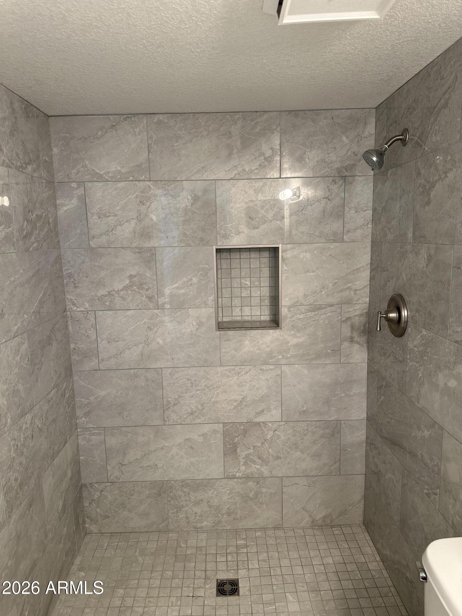 1720 East Thunderbird Road, Unit 1019 Phoenix, AZ 85022 - Photo 28 of 47 a bathroom with a shower
