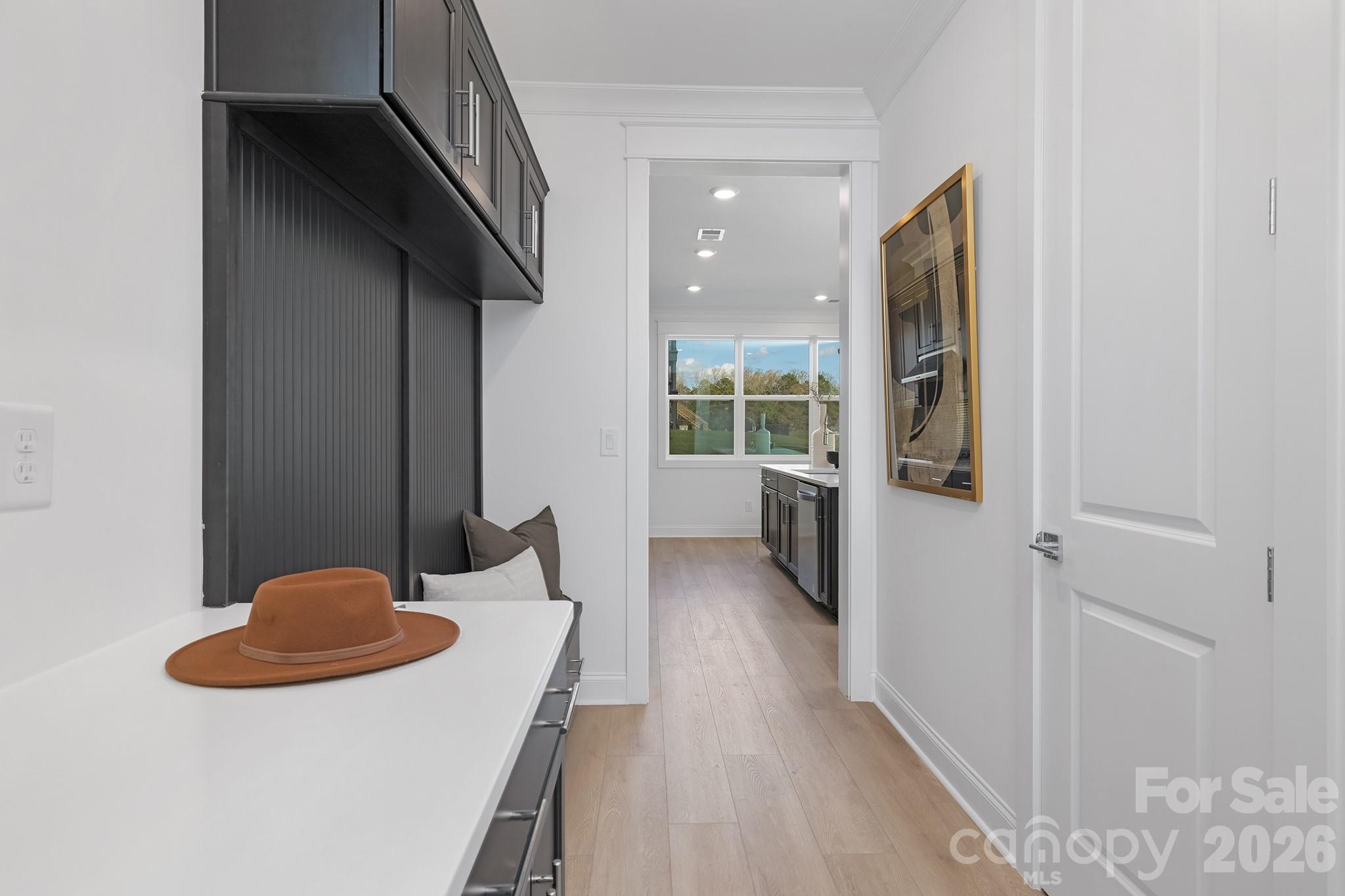 220 Windy Dell Drive Tega Cay, SC 29708 - Photo 11 of 13 a view of a kitchen with furniture and wooden floor