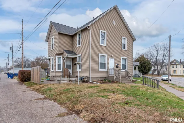 a front view of house with yard