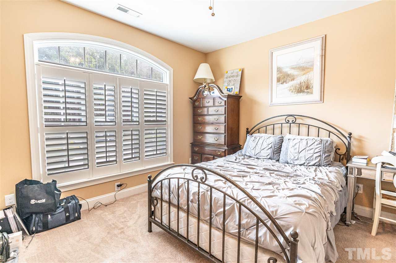 535 Barber Road Carthage, NC 28327 - Photo 19 of 30 a bedroom with a bed and a window