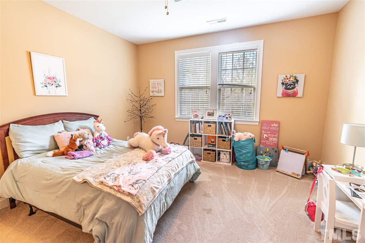 535 Barber Road Carthage, NC 28327 - Photo 23 of 30 a bedroom with a bed and a table