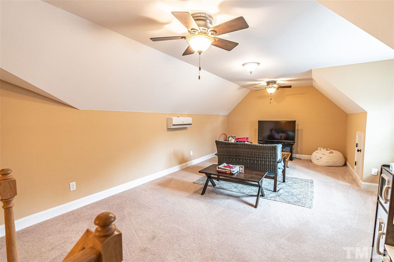 535 Barber Road Carthage, NC 28327 - Photo 26 of 30 a living room with furniture and a rug