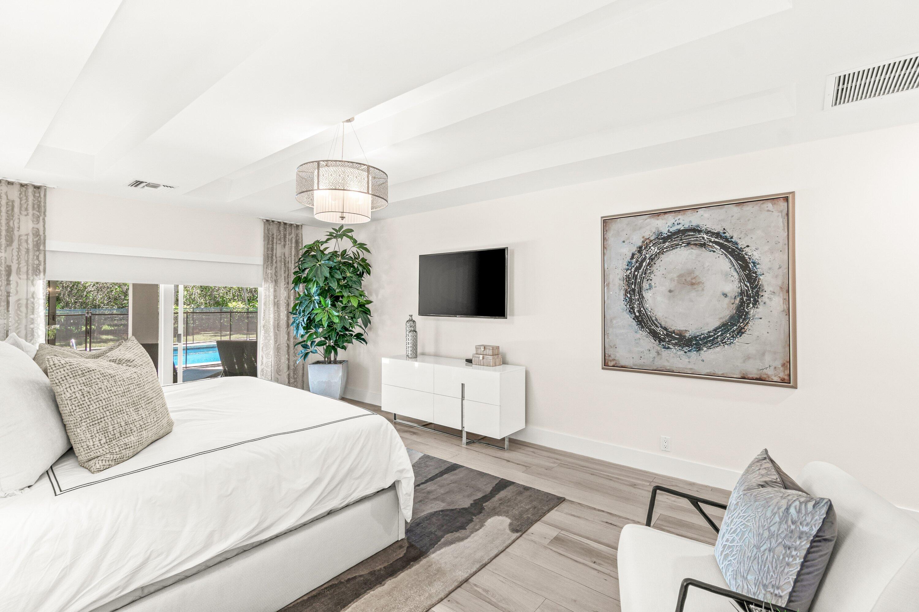 2367 Queen Palm Road Boca Raton, FL 33432 - Photo 24 of 45 a bedroom with bed and windows