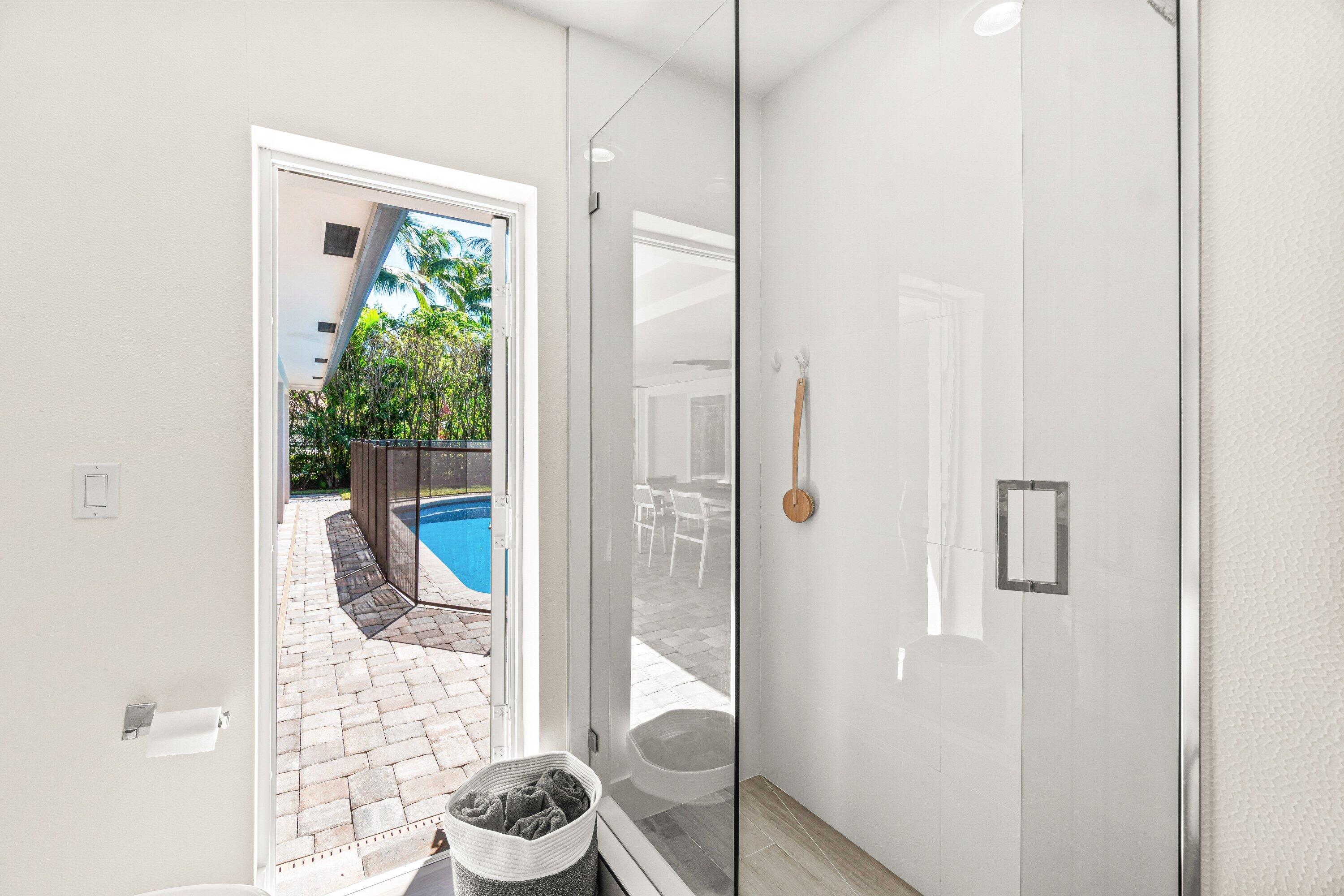 2367 Queen Palm Road Boca Raton, FL 33432 - Photo 32 of 45 a bathroom with a toilet and a shower