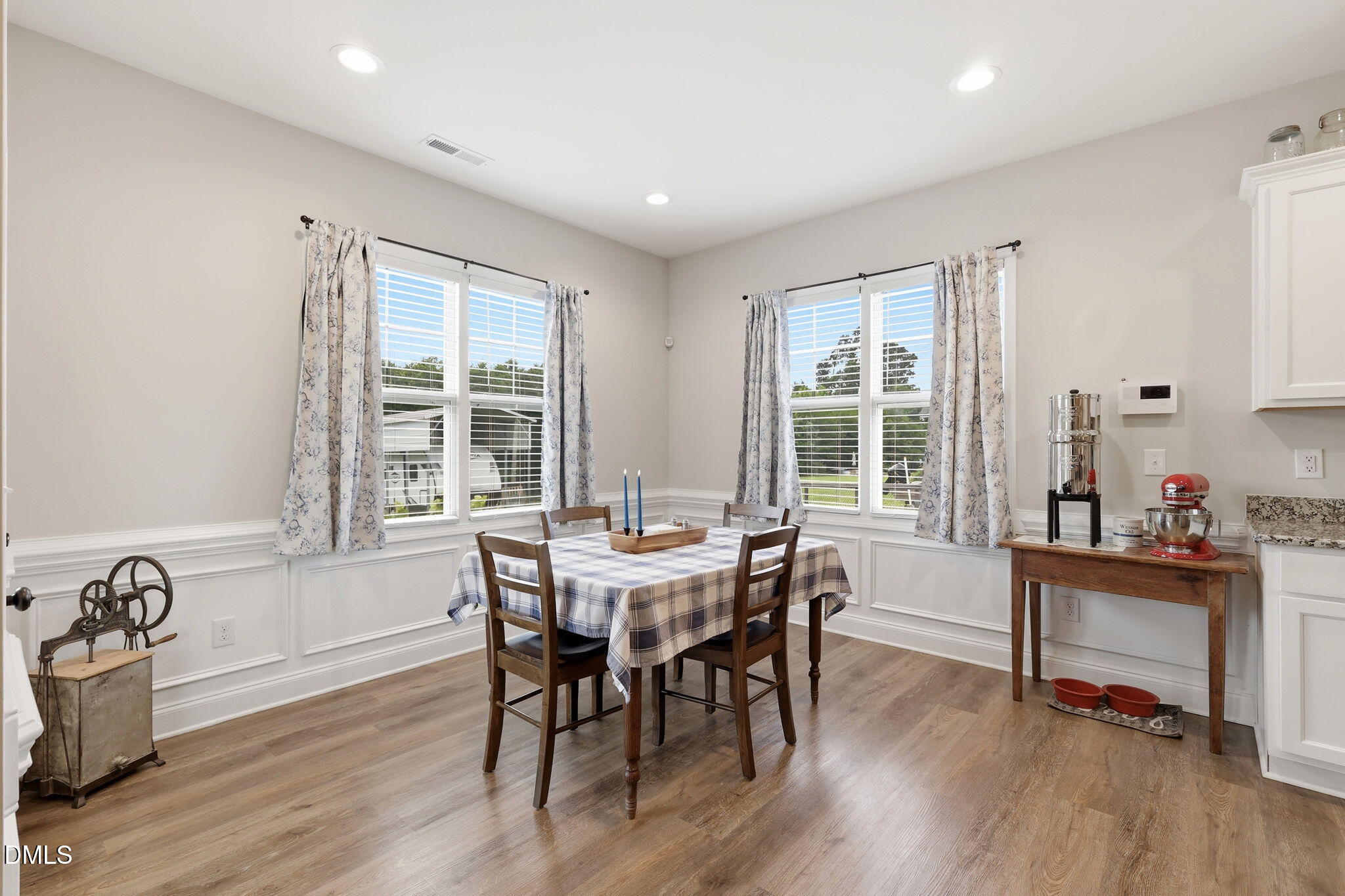 5098 Spring Hill Church Road Lillington, NC 27546 - Photo 11 of 36 a view of a dining room with furniture window and wooden floor