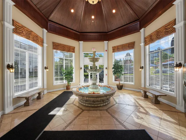 a media room with lots of chairs and a projector