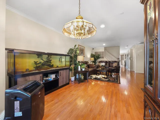 a living room with lots of furniture and a flat screen tv