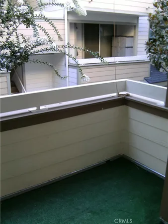 a bathroom with a tub and a mirror