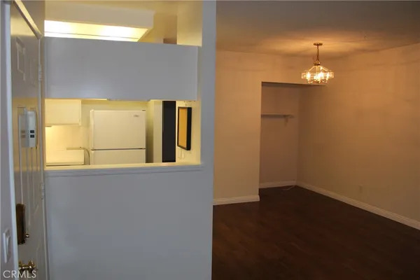 a view of a livingroom with wooden floor