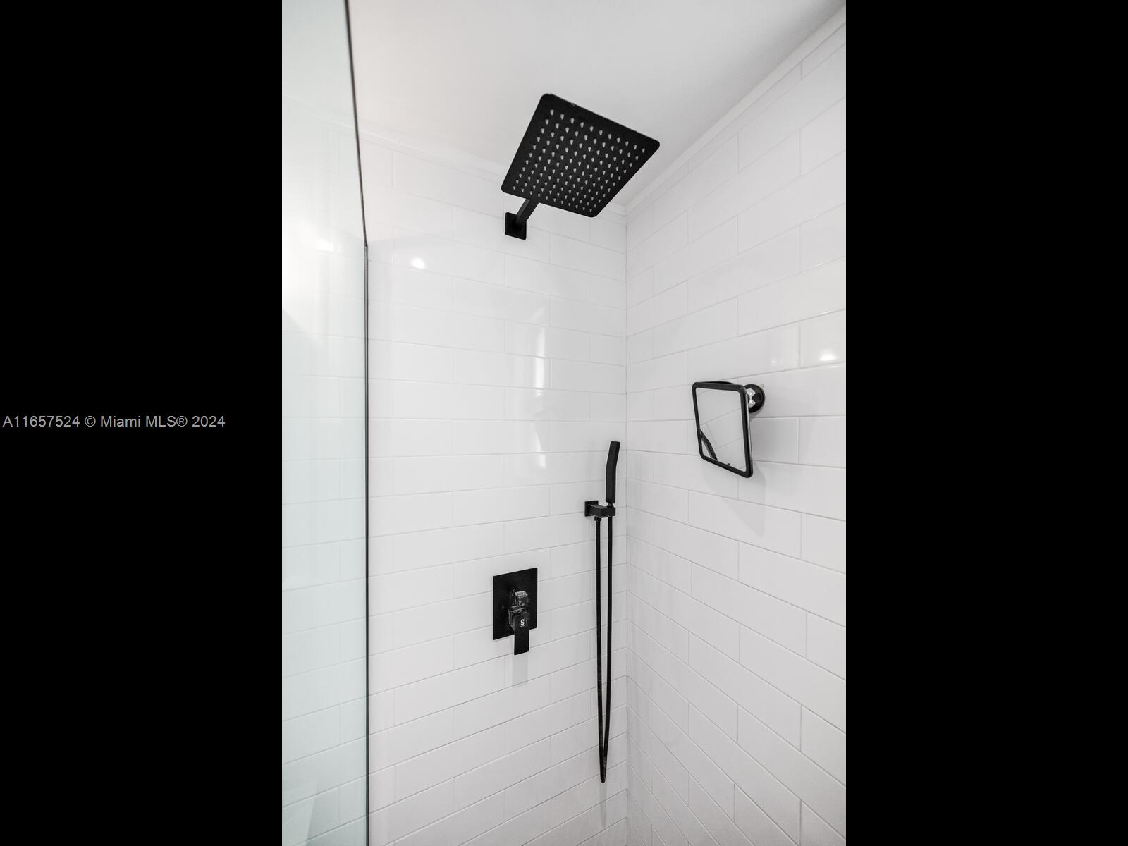 742 12th Street, Unit 2 Miami Beach, FL 33139 - Photo 19 of 27 a picture of a bathroom with a shower