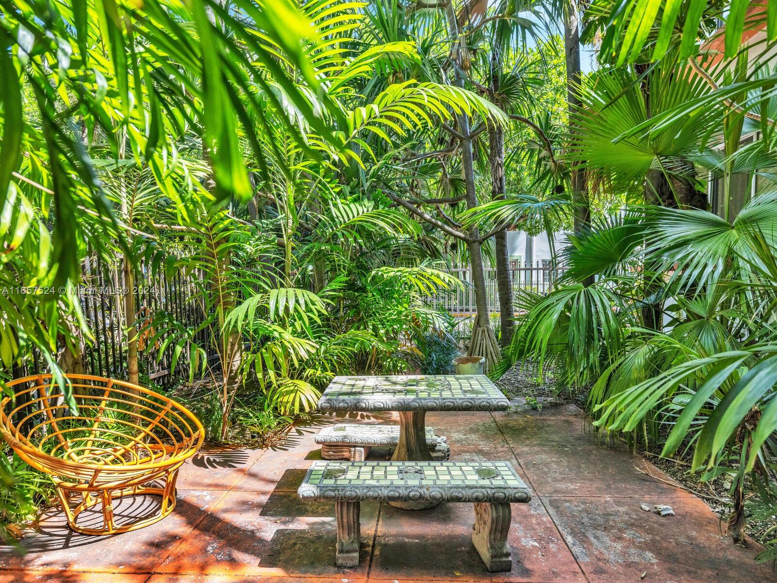 742 12th Street, Unit 2 Miami Beach, FL 33139 - Photo 22 of 27 a view of a fountain with plants