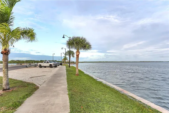 a view of a lake with a big yard