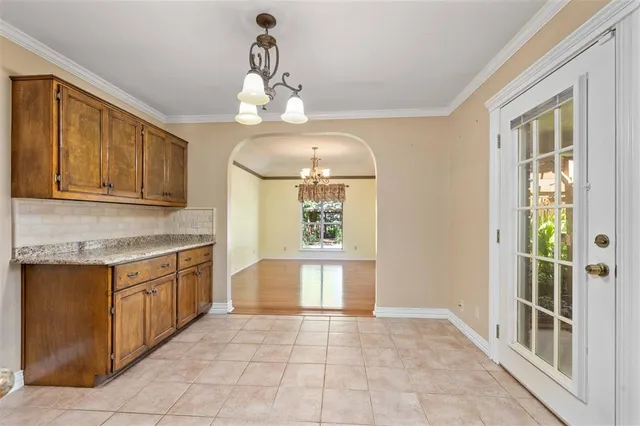 a large kitchen with a stove
