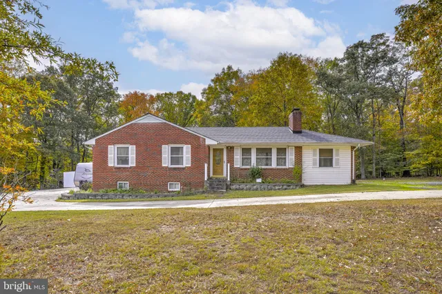 a house view with a garden space