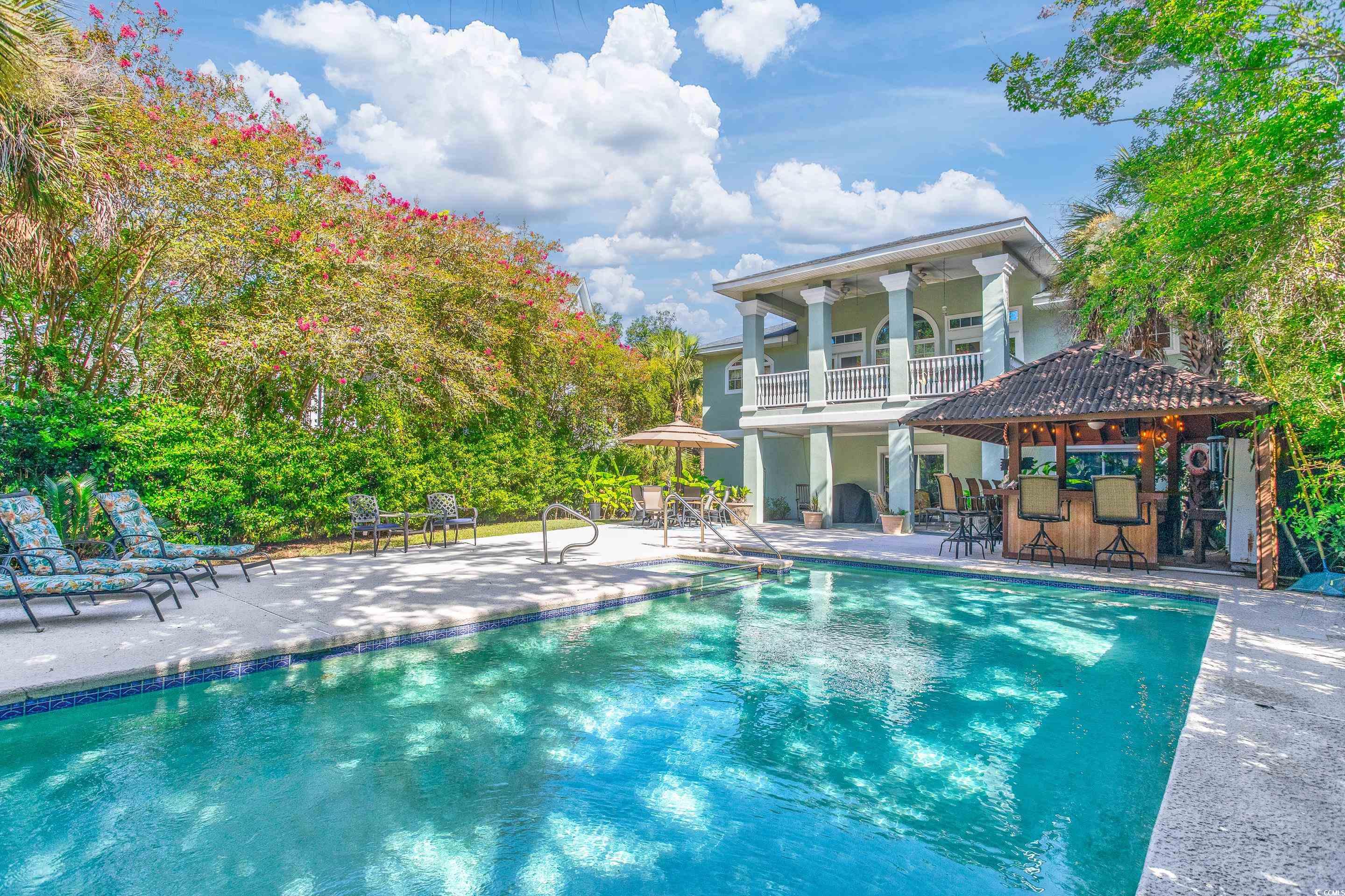 4907 Woodview Lane Myrtle Beach, SC 29575 - Photo 30 of 30 Outdoor pool with a patio